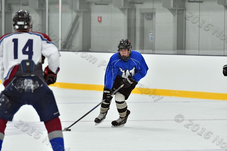 Wheaton College Men\'s Ice Hockey vs Middlesex Community College. - Photo By: KEITH NORDSTROM